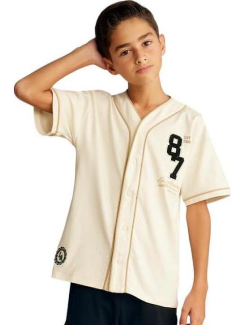 PLAYERA ESTAMPADA MARFIL NEXT CO