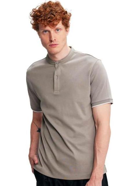 PLAYERA POLO CORTA LISA GRIS NEXT CO